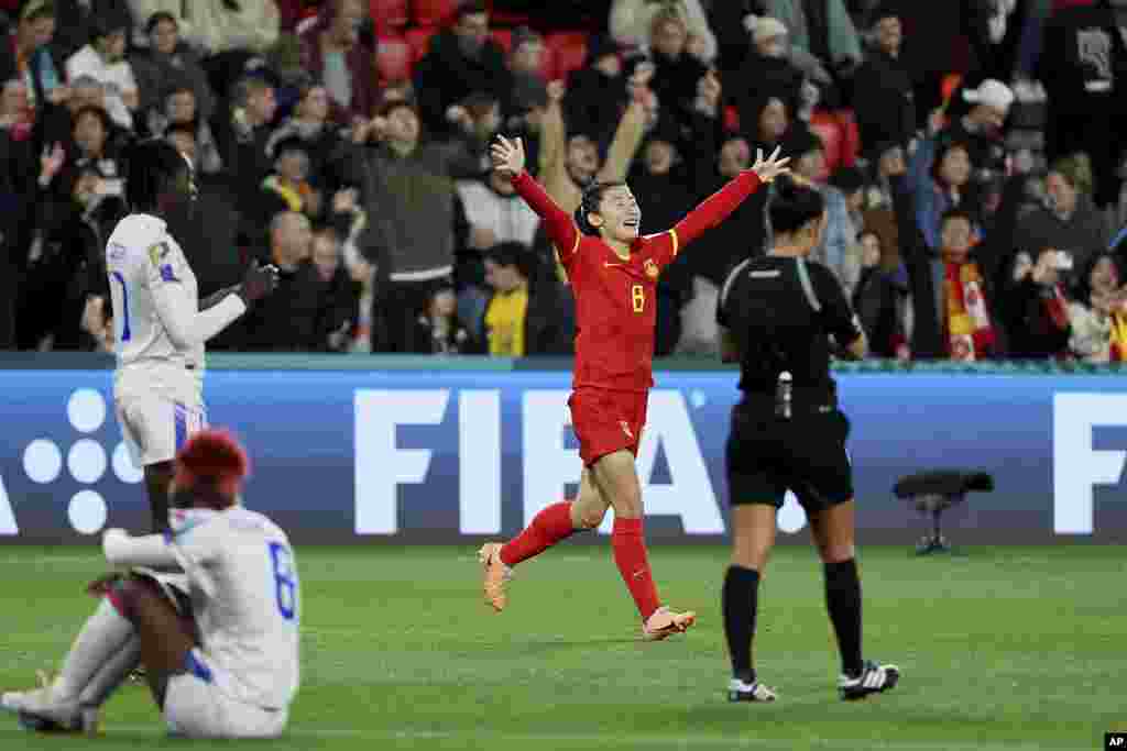China's Yao Wei celebrates at the end of the Women's World Cup Group D soccer match between China and Haiti in Adelaide, Australia. China won 1-0 despite playing with 10 players for more than an hour after China midfielder Zhang Rui received a red card. This victory marks the second time in Women's World Cup history that a team has won with 10 players on the field, with the previous occurrence taking place in 2011. 
