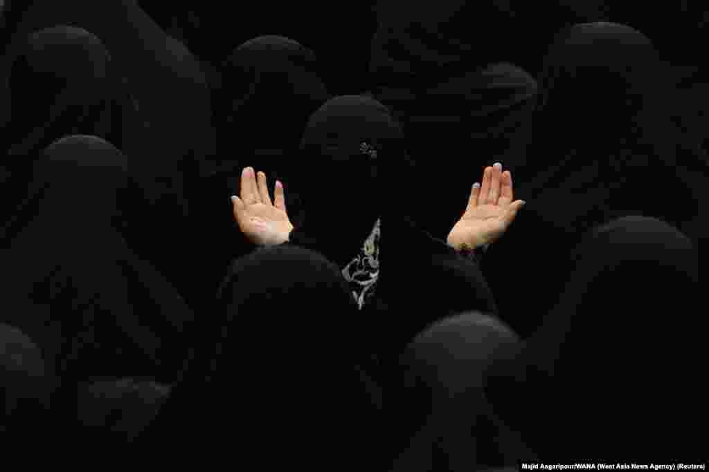 Iranian Shi'ite Muslim women take part in a mourning ritual ahead of Ashura, the holiest day on the Shi'ite Muslim calendar in Tehran.