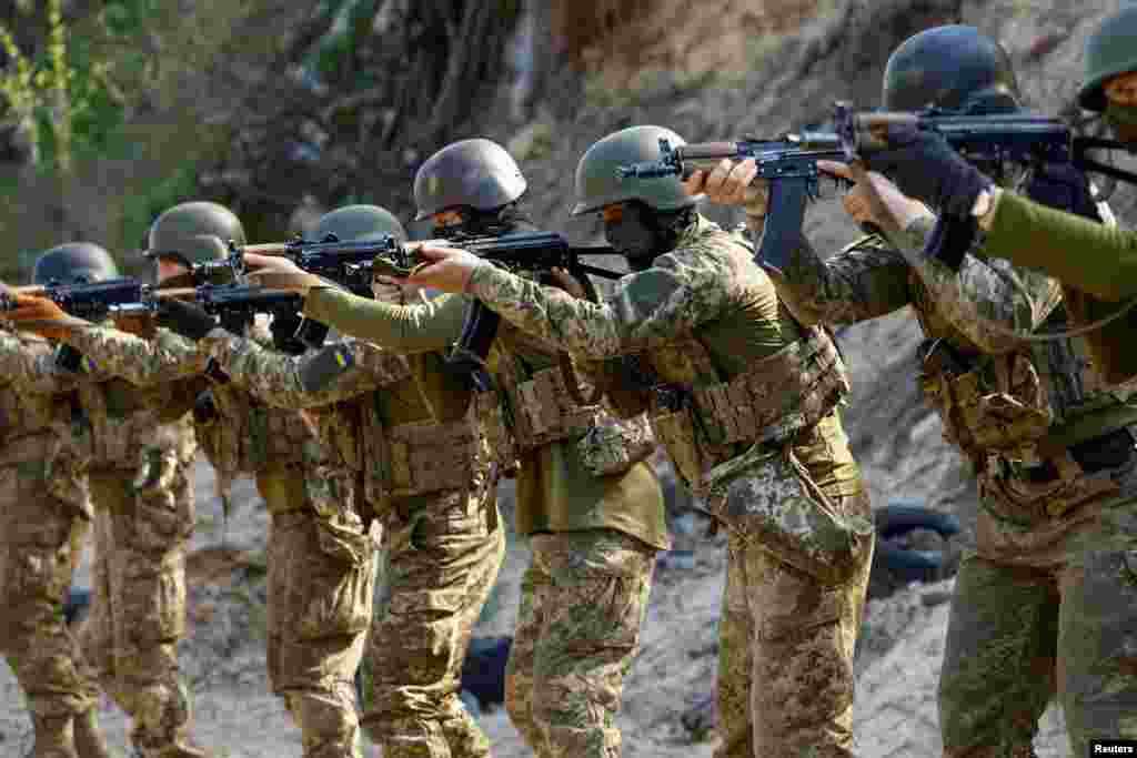 Members of the Siberian Battalion of the Ukrainian Armed Forces' International Legion attend military exercises, amid Russia's attack on Ukraine, at an undisclosed location in Kyiv region, Ukraine.