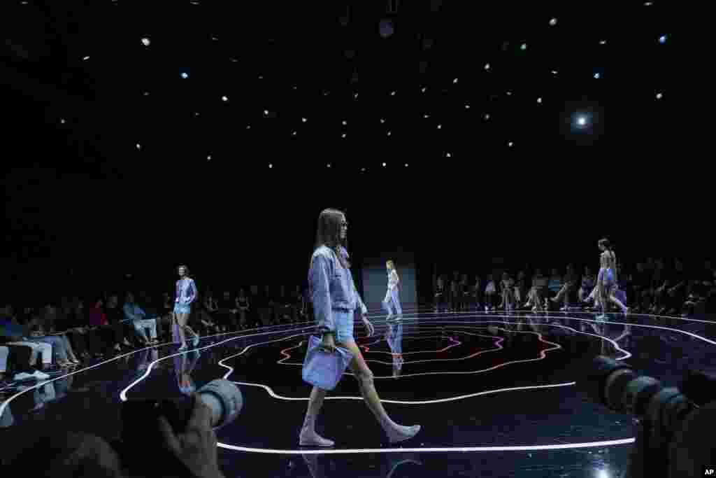Models wear creations as part of the Emporio Armani women's Spring Summer 2024 collection presented in Milan, Italy.