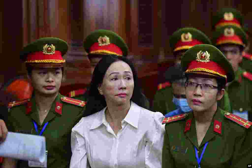 Business woman Truong My Lan, front center, attends a trial in Ho Chi Minh City, Vietnam. The 67-year-old chair of the real estate company Van Thinh Phat was sentenced to death in the country's largest financial fraud case ever, state media said. She was accused of fraud amounting to $12.5 billion — nearly 3% of the country's 2022 GDP. 