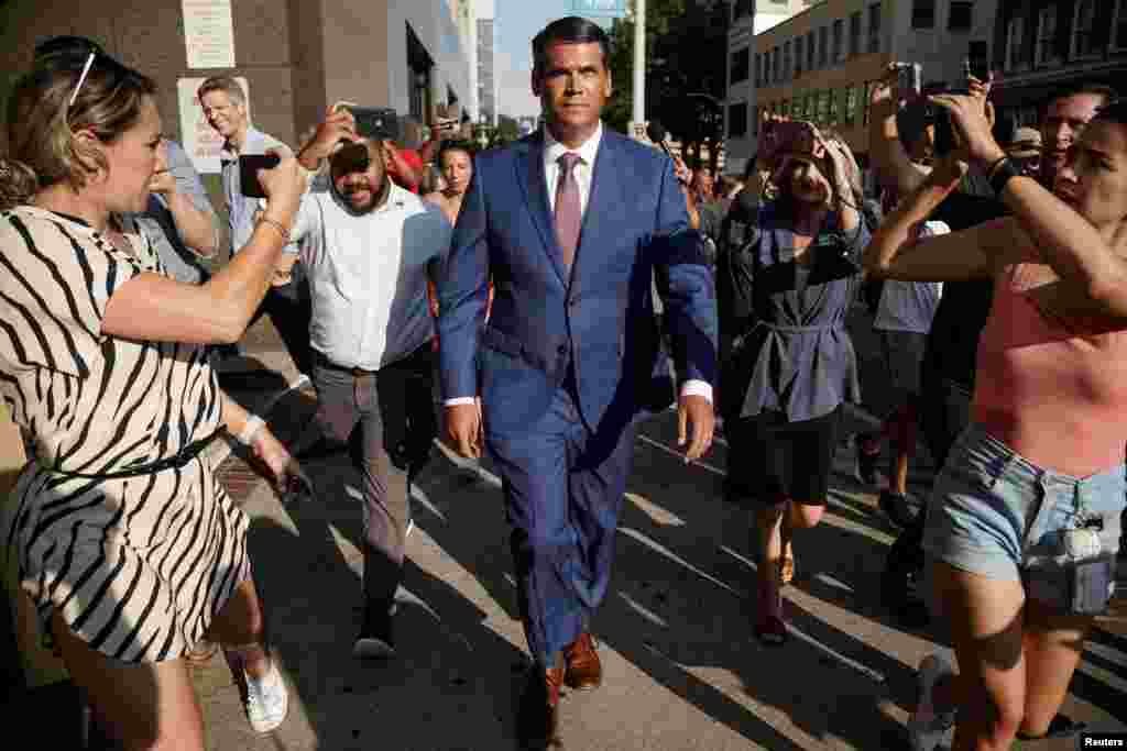 The state of Georgia's former lieutenant governor, Geoff Duncan, leaves the Lewis R. Slaton Courthouse after testifying before a grand jury led by Fulton County District Attorney Fani Willis, who is probing whether Donald Trump and his allies illegally sought to overturn the state's 2020 election results, in Atlanta, Georgia, Aug. 14, 2023.