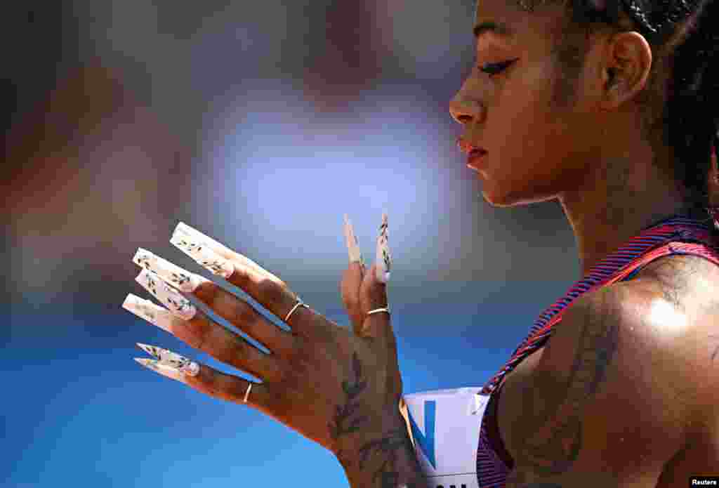 Sha'carri Richardson readies herself for the start of heat 2 in the women's 200m at the World Athletics Championship at the National Athletics Centre, Budapest, Hungary.