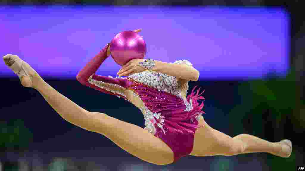 Japan's Mei Tsuruta competes in the rhythmic gymnastics individual qualification and individual team final event during the Hangzhou 2022 Asian Games in Hangzhou, China.