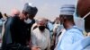 United Nations Secretary General Antonio Guterres is introduced to Borno state officials by Borno State Governor Babagana Zulum on arrival at Maiduguri International Airport Borno, May 3, 2022. 