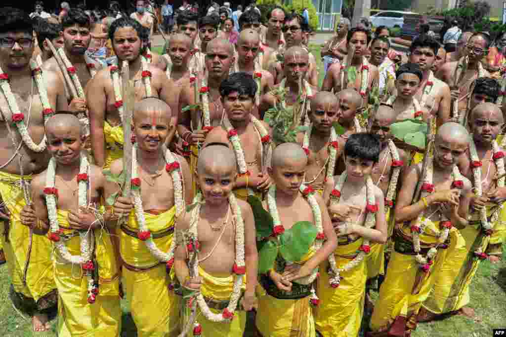 Young Hindu boys belonging to the Brahmin community take part in a mass "Upanayana" - the sacred thread ceremony, in Bangalore, India.