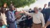 FILE - U.N. Secretary-General Antonio Guterres waves to the crowd upon his arrival in Maiduguri, Nigeria, May 3, 2022.