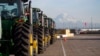 FILE - John Deere tractors are shown as they are readied for export to Asia in Tacoma, Wash., Nov. 4, 2019. U.S. President Joe Biden will unveil his administration's long-awaited Indo-Pacific Economic Framework on May 23, 2022, in Japan.