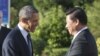 美国总统奥巴马(左)和中国国家主席习近平9月6日在圣彼得堡会晤前握手。