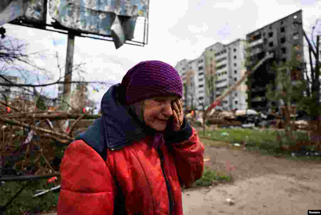 Zinaida Makishaiva, 82, reacts as she recounts how Russian soldiers treated her in Borodyanka, Kyiv region, Ukraine. Zinaida said Russian soldiers came to her house and told her to go to the basement. She said soldiers started to shoot around her to scare her. "God saved my life," she said.