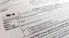FILE - A W-4 form on Feb. 5, 2020, in New York. The IRS will receive tens of millions of filings electronically and through paper forms.