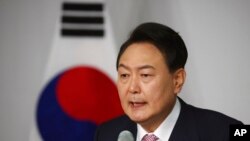 South Korea's president-elect Yoon Suk Yeol speaks during a news conference at the National Assembly in Seoul, South Korea, March 10, 2022.