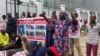 Relatives of the Abuja-Kaduna train kidnapping victims protest, following a threat from the abductors to kill the victims if demands are not met, at the Ministry of Transportation, in Abuja, Nigeria, July 25, 2022.
