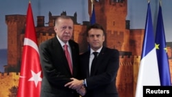 Turkish President Erdogan meets with French President Macron in Madrid