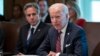 Secretary of State Antony Blinken listens to President Joe Biden at the White House, Sept. 6, 2022. Biden has decided to not designate Russia a state sponsor of terrorism, the White House said Tuesday.
