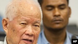 Khieu Samphan, former Khmer Rouge head of state, looks on before his final statements at the U.N.-backed war crimes tribunal in Phnom Penh, Cambodia, Thursday, Oct. 31, 2013.