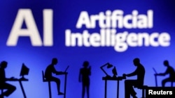 FILE - Figurines with computers and smartphones are seen in this illustration taken Feb. 19, 2024. Generative AI tools struggle to effectively respond to false narratives, according to a September study by a media research group. 