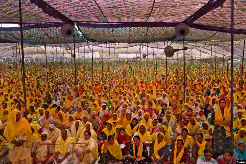 Women farmers attend a protest against farm laws on the occasion of International Women's Day at Bahadurgar near Haryana-Delhi border, India.