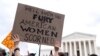 People protest following the Supreme Court's decision to overturn Roe v. Wade in Washington, June 24, 2022. 