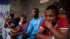 File -The family of Theresa Ogbu, 51, who was a victim of the attack by gunmen on worshippers during a Sunday mass service, attend an interview with Reuters at their home in Owo, Ondo, Nigeria, June 7, 2022. 