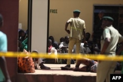 Recaptured inmates are seen inside the Kuje Medium Prison in Abuja, Nigeria on July 6, 2022, after suspected Boko Haram gunmen attacked the prison.