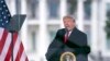FILE - In this Jan. 6, 2021, file photo President Donald Trump speaks during a rally protesting the electoral college certification of Joe Biden as President in Washington.