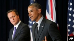 El presidente Barack Obama junto al primer ministro británico, David Cameron, en Bruselas.