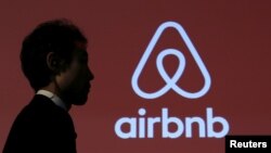 FILE - An Airbnb logo in Tokyo, Japan, Nov, 26, 2015.