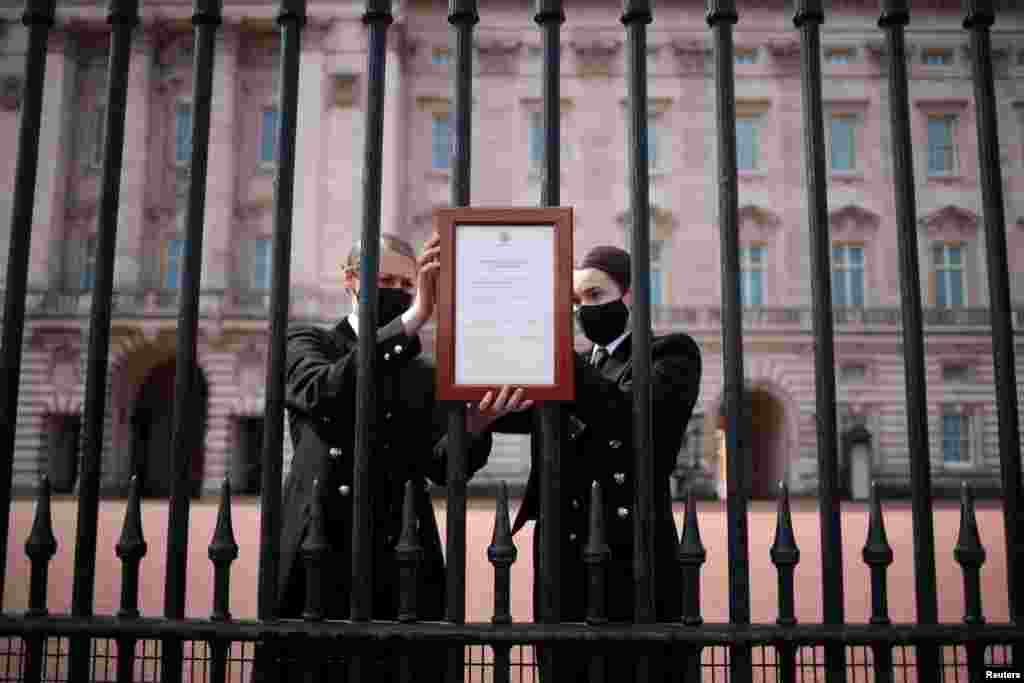 An announcement is attached to the fence of Buckingham Palace stating that Britain's Prince Philip, husband of Queen Elizabeth, has died at the age of 99, in London, Britain.