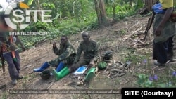 Picha inawaonyesha waasi wanaodai ni kikundi cha ISIS cha kigaidi wakiwa katika mavazi ya kijeshi huko Mabib, Ituri, DRCAugust 9 2021. (Photo/SITE)