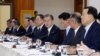 South Korean President Moon Jae-in speaks during a meeting with executives from South Korea's top 30 conglomerates at the Blue House in Seoul.