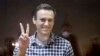 Алексей Навальный во время судебного процесса в Москве. 20 февраля 2021 года. (AP Photo/Alexander Zemlianichenko, File).