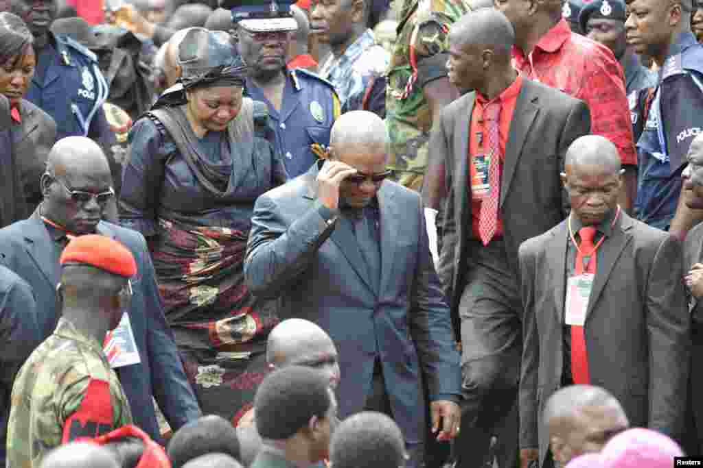 Ghana's President John Dramani Mahama (C) arrives for the beginning of the three days of funeral ceremonies for late President John Atta Mills, Accra, Ghana, August 8, 2012.