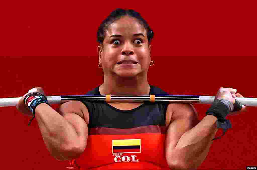 Weightlifter Mercedes Perez of Colombia competes in the women's 64kg during the Tokyo 2020 Olympics at Tokyo International Forum, Tokyo, Japan.