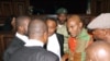 FILE - Biafran separatist leader Nnamdi Kanu, center right, speaks to his lawyers at the Federal High court in Abuja, Nigeria, Jan. 29, 2016. 