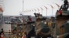 FILE - Amphibious assault vehicles of the South Korean Marine Corps travel during a military exercise as a part of the annual joint military training called Foal Eagle between South Korea and the U.S. in Pohang, South Korea, April 5, 2018. 