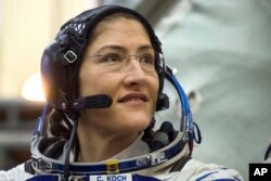 FILE - U.S. astronaut Christina Koch attends her final exam at the Gagarin Cosmonauts' Training Center in Star City outside Moscow, Russia, Feb. 20, 2019.