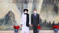 ཏ་ལི་བྷན་གྱི་མཐོ་རིམ་འགོ་ཁྲིད་ཨབ་རྡུལ་གྷ་ཎི་བྷ་ར་དྷར་རྒྱ་ནག་གི་ཐེན་ཅིང་གྲོང་ཁྱེར་དུ་ཕྱིན་ཏེ་ཕྱི་སྲིད་བློན་ཆེན་ཝང་དབྱི་ལ་ཐུག་འཕྲད་གྲོས་མོལ་བྱས།