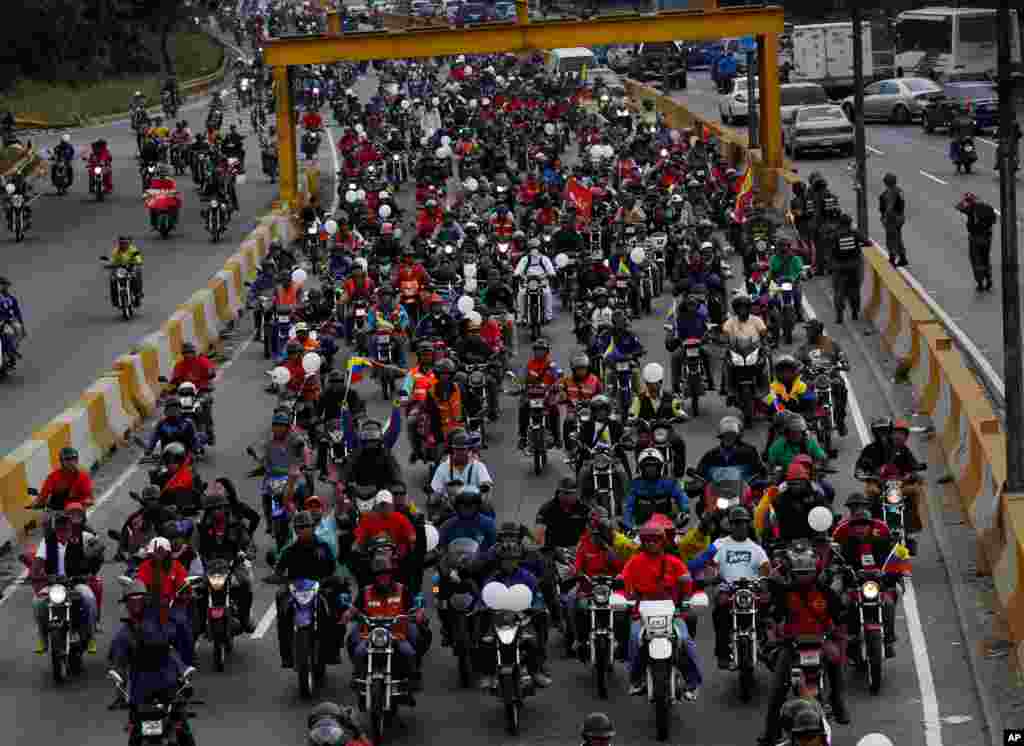 Motorcyclists attend a rally in support of Venezuela's President Nicolas Maduro in Caracas, Feb. 24, 2014.