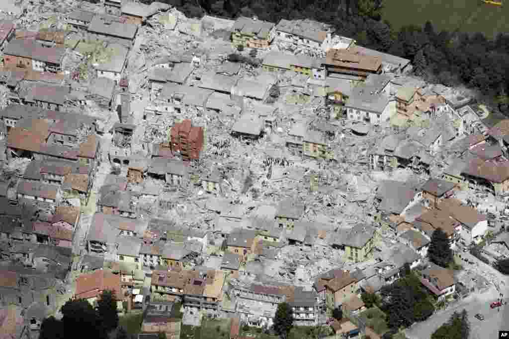This aerial photo shows the damaged buildings in the town of Amatrice, central Italy, after a 6.2 magnitude earthquake killed at least 73 people. The mayor of Amatrice, Sergio Pirozzi, said, "Three quarters of the town is not there anymore.''