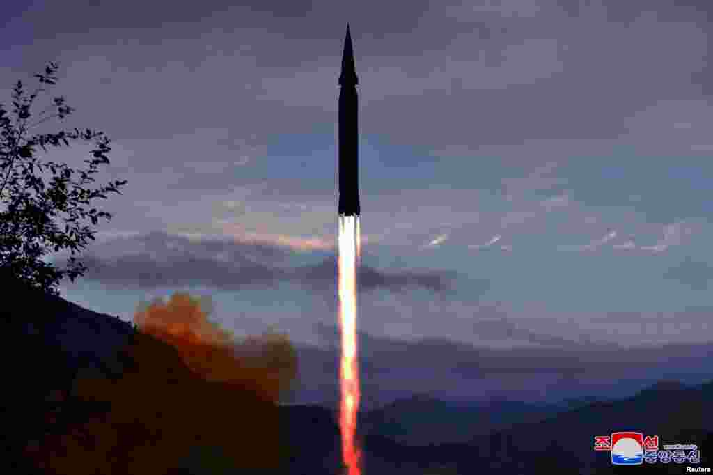 The newly developed hypersonic missile Hwasong-8 is test-fired by the Academy of Defense Science of the DPRK in Toyang-ri, Ryongrim County of Jagang Province, North Korea, in this undated photo released by North Korea's Korean Central News Agency (KCNA). 