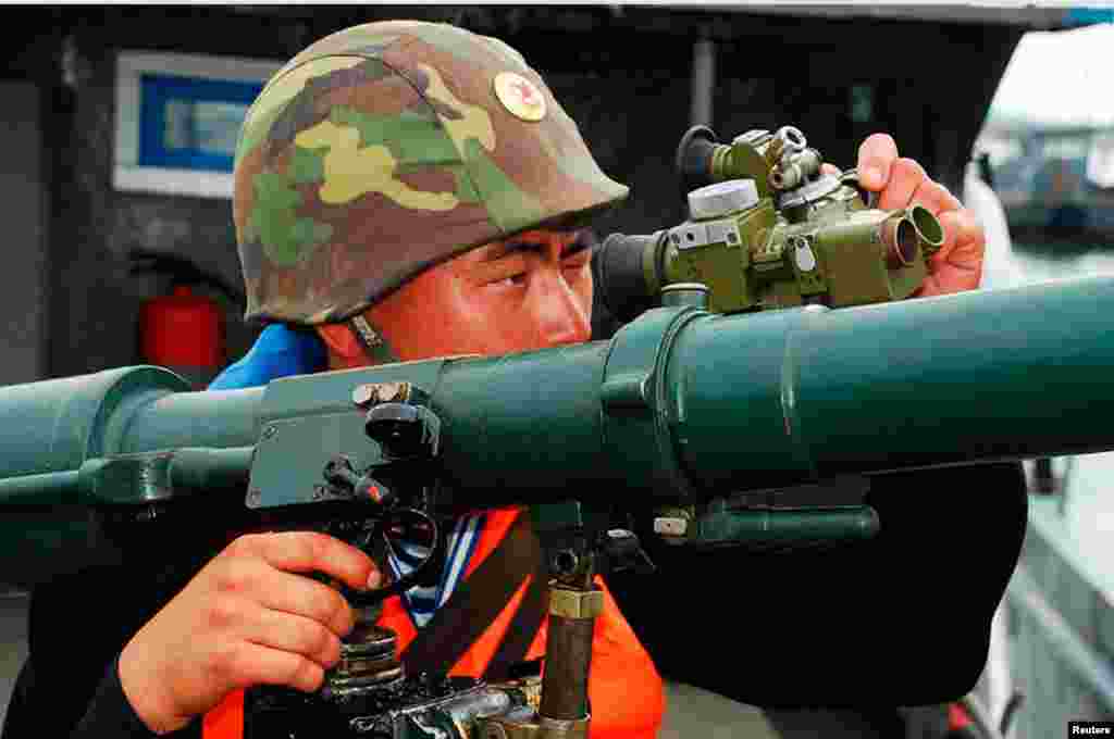 Tentara Korea Utara dalam pelatihan militer di lokasi yang dirahasiakan (19/3). (Foto: Kantor berita KCNA).