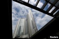 FILE - An exterior view of Four Seasons Hotel in Hong Kong Feb. 1, 2017, where Chinese billionaire Xiao Jianhua was last seen on Jan. 27.