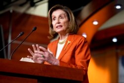 FILE - Speaker of the House Nancy Pelosi, D-Calif., speaks to reporters at the Capitol in Washington, Jan. 13, 2022.