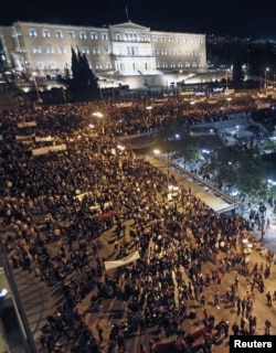 Greek protestors gather in front of the parliament in Syntagma square during a 48-hour strike by the two major Greek workers unions in central Athens, November 7, 2012.