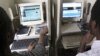 FILE - Nigerians browse the internet at a cybercafe in Lagos, Nigeria. 
