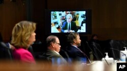 Američki senatori slučaju doktora Entonja Faučija, direktora Nacionalnog instituta za alergije i infektivne bolesti na pretresu 12. maja 2020. 