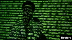 An illustration picture shows a projection of binary code, including Russian words, onto a man, taken in Warsaw Oct. 8, 2014.