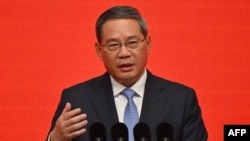 Perdana Menteri China Li Qiang menyampaikan pidatonya pada Forum Pembangunan China di Beijing pada 24 Maret 2024. (Foto: AFP)