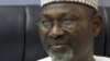 FILE - Independent National Electoral Commission (INEC) Chairman Attahiru Jega displays the timetable. 